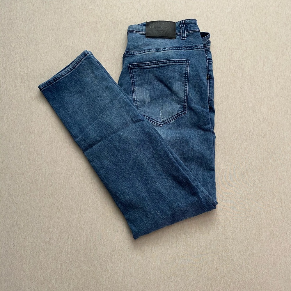 Painted Distressed Young & Rckless size 34